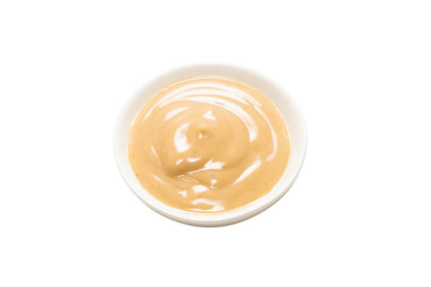 istock Mushroom sauce in a bowl isolated on white background. 1311286779