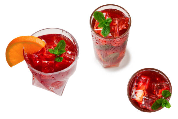 istock Red fresh drink with ice, grapefruit and mint isolated on white. Space for text or design. 1311286825