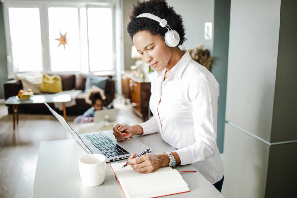 istock Single African American mother is working from home 1311287806