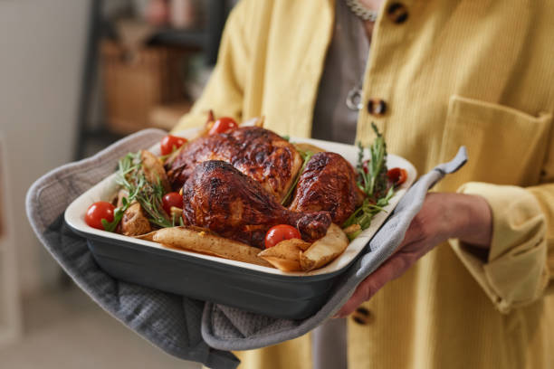 istock Woman serving the dish 1311288577