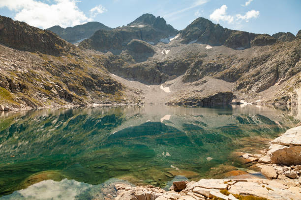 istock A transparent lake in the mountains, Aragonese Pyrenees, Spain. 1311289770
