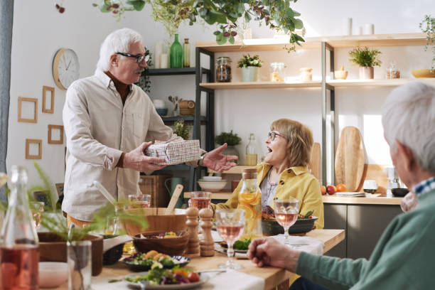 istock Senior woman happy with present 1311289923