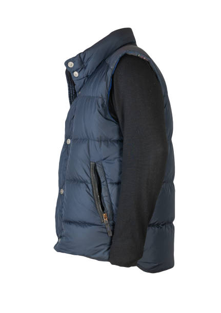 istock Sleeveless jacket and sweater isolated on white background. 1311291260