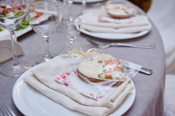 istock Table setting with sparkling wineglasses and cutlery on table, copy space. Menu mockup, place setting at wedding reception. Table served for wedding banquet in restaurant 1311296717