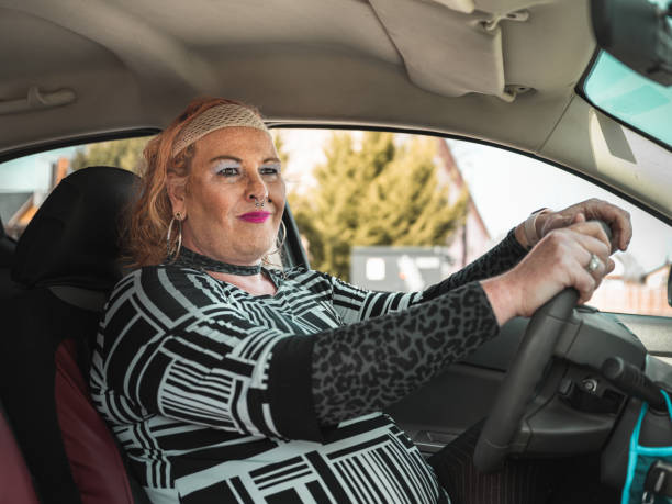 istock Transgender woman driving her car 1311296974