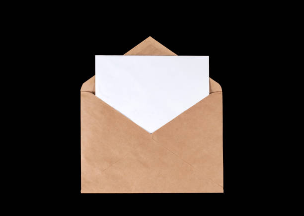 istock Brown paper craft envelope with a white sheet of paper inside. Copy space 1311298369