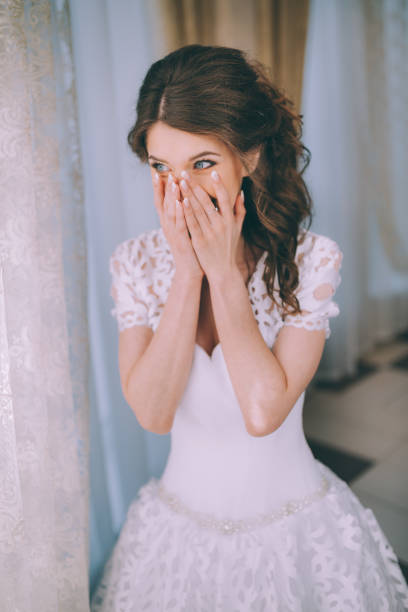 istock young brunette bride poses for the camera 1311304945