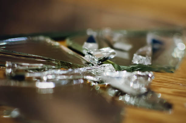 istock Shards of a broken mirror, close-up. 1311306325