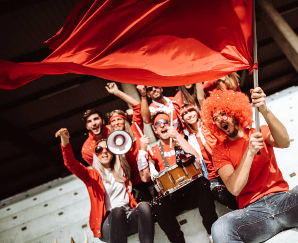 istock supporters screaming at the stadium all together 1311307025