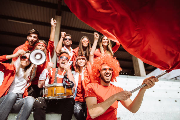istock supporters screaming at the stadium all together 1311307685