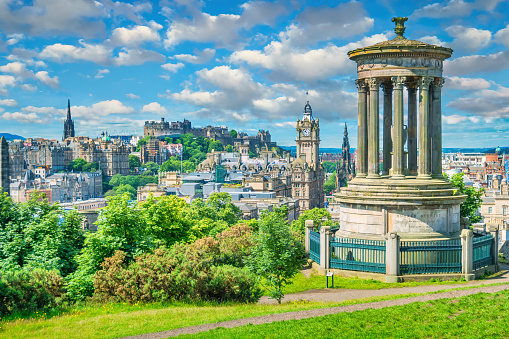 Downtown Edinburgh Scotland as seen from Calton Hill on a sunny day.