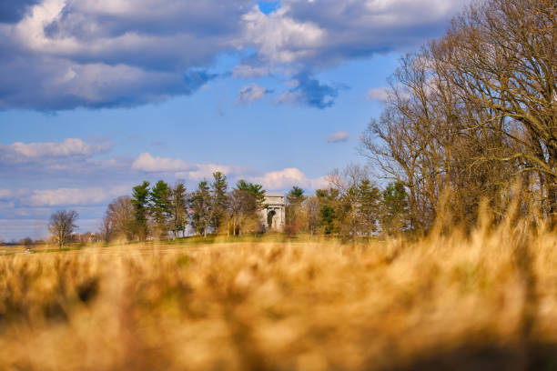 The National Memorial Arch stands in the distance at Valley Forge National Park in Pennsylvania.