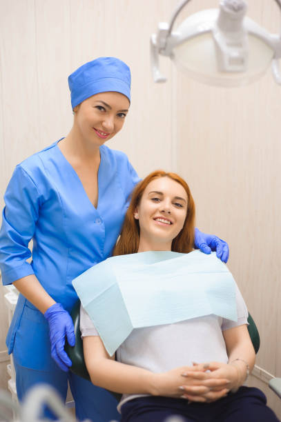 istock Dentist examining a patient's teeth in the dentist. 1311311726
