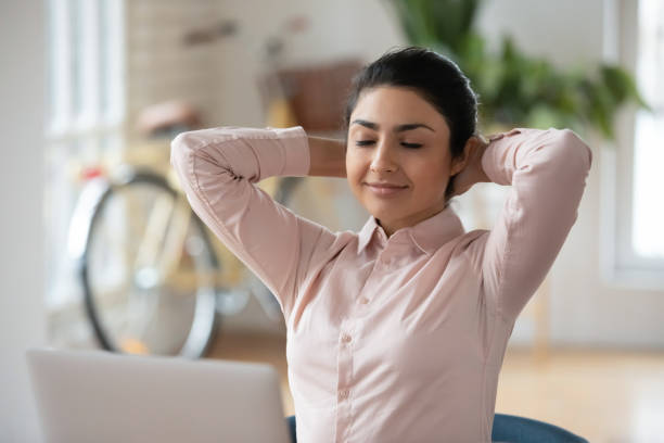 istock Calm Indian female employee relax at workplace 1311315588