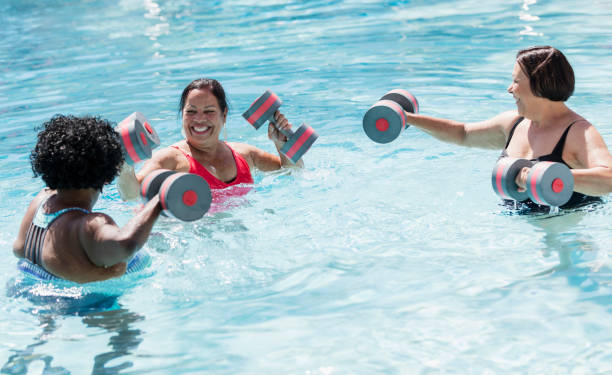 istock Three senior women doing water aerobics 1311316573