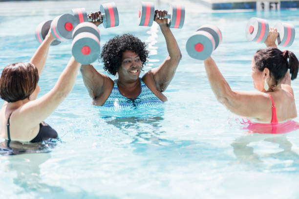 istock Three senior women doing water aerobics 1311316574