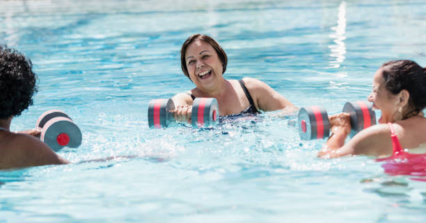istock Three senior women doing water aerobics 1311316610