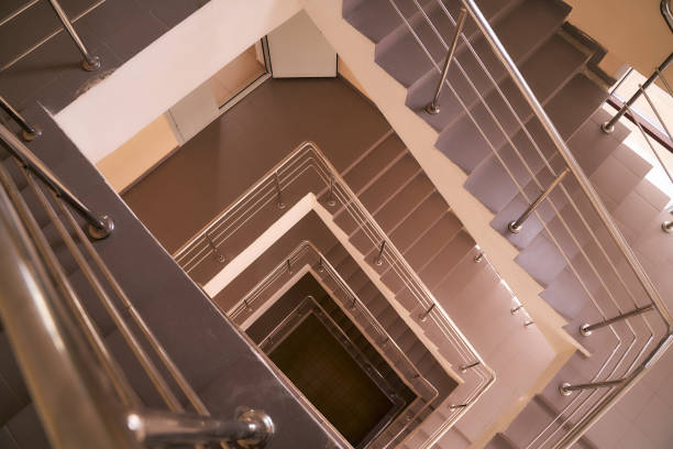 istock Tunnel descent down the stairs. Steel railings 1311320129