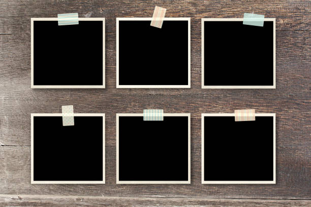 istock Six retro photos on old wooden board 1311320973