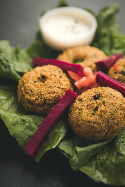 Chickpea falafel balls served with hummus and olive oil