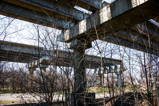 istock Abandoned construction. Highway overpass construction. Site of under construction viaduct. 1311322588