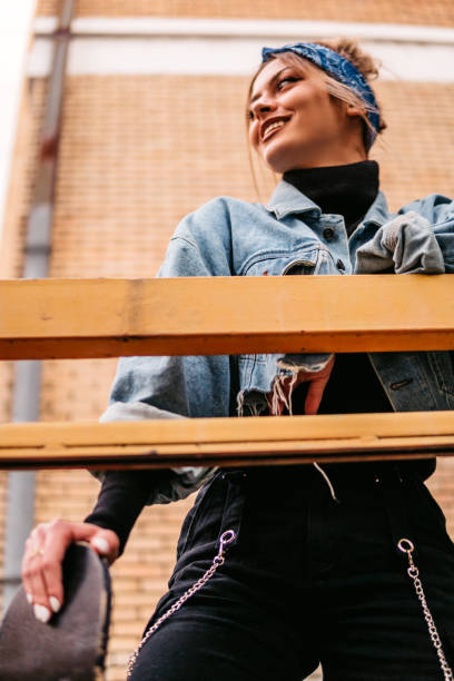istock Young woman outdoors with skateboard 1311323271