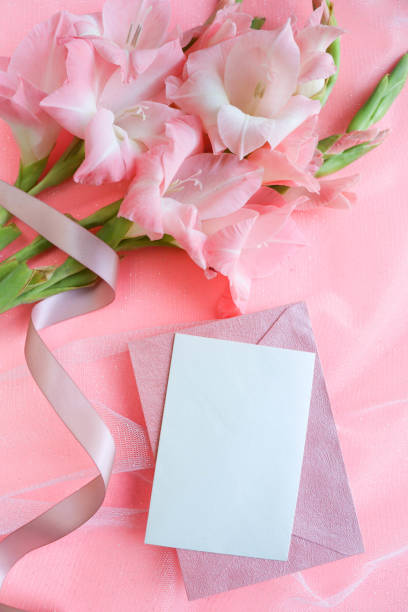 istock bouquet of pink gladioli and space for text 1311323899