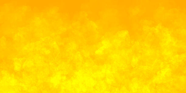 istock bright yellow light abstract background with spots of paint. the basis for the decoration of holiday banners, cards, brochures, booklets, covers. sunny warm backdrop. 1311324402