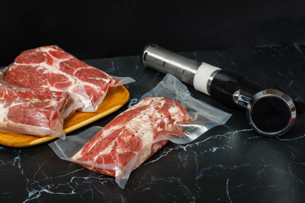 istock Meat in bags and sous vide devices . 1311325109