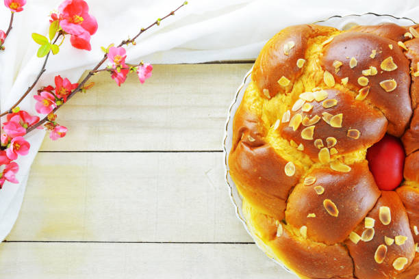 istock Easter bread and  flowering quince 1311326343