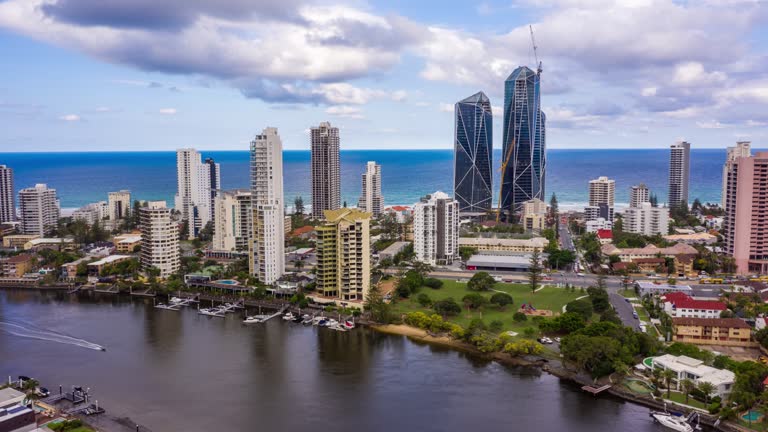 Gold Coast Queensland Australia timelapse aerial flyover shot showing waterfront housing and canal estates