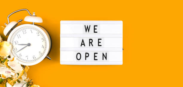 istock We are open sign banner background, lightbox with text message on a yellow background 1311335060
