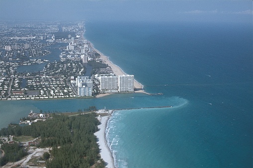 Miami, Florida, 1978. Miami with a stretch of beach and a river.