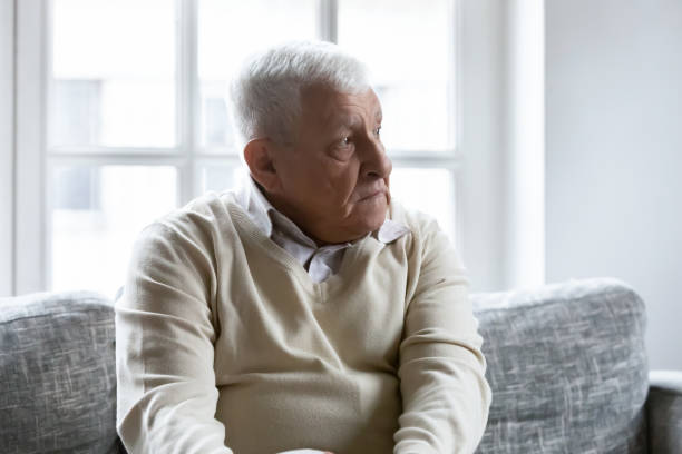istock Thoughtful retired man spend time at home on his own 1311337316