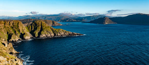istock Sunset wide angle view from the island Runde in Norway 1311337513