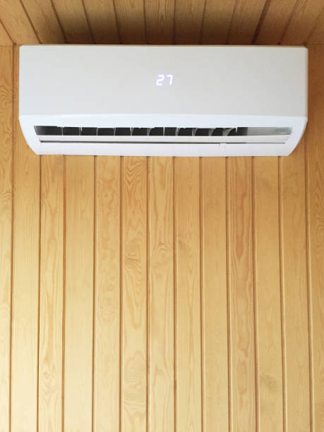 air conditioner hanging on the wood wall background - air air conditioner appliance plank imagens e fotografias de stock