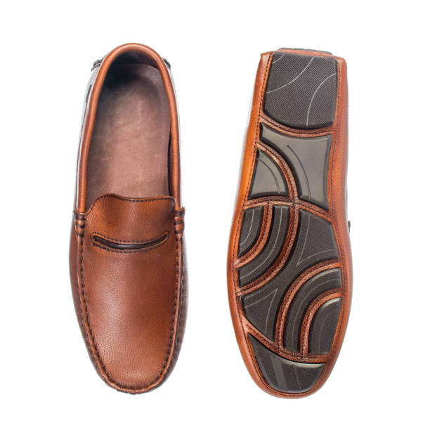istock brown moccasins on a white background 1311338291