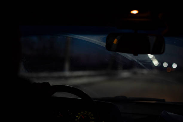 istock blurred view from the car interior through a cloudy and dirty windshield, in bad weather conditions and illumination, the front and rear background is fuzzy 1311338359