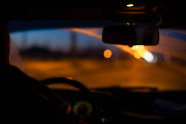 istock blurred view from the car interior through a cloudy and dirty windshield, in bad weather conditions and illumination, the front and rear background is fuzzy 1311338362