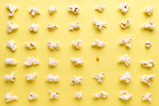 istock various forms of tasty salted popcorn and one grain of corn 1311339175