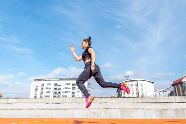 istock Woman athlete jumping during exercising 1311341650