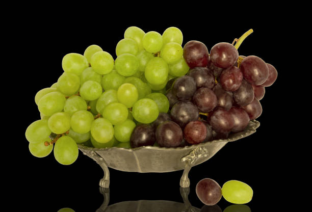istock Grapes on the plate on a Black background 1311342989