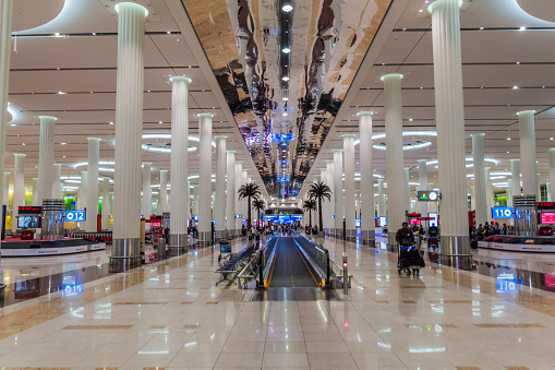 DUBAI, UAE - OCTOBER 21, 2016: Baggage reclaim area of Terminal 3 of Dubai airport, United Arab Emirates