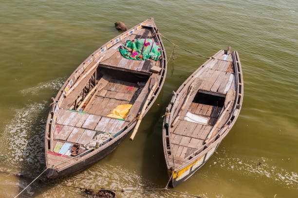 istock Small boats at river Ganges in Varanasi, Ind 1311343380