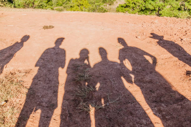 istock Silhouettes of several peop 1311344647