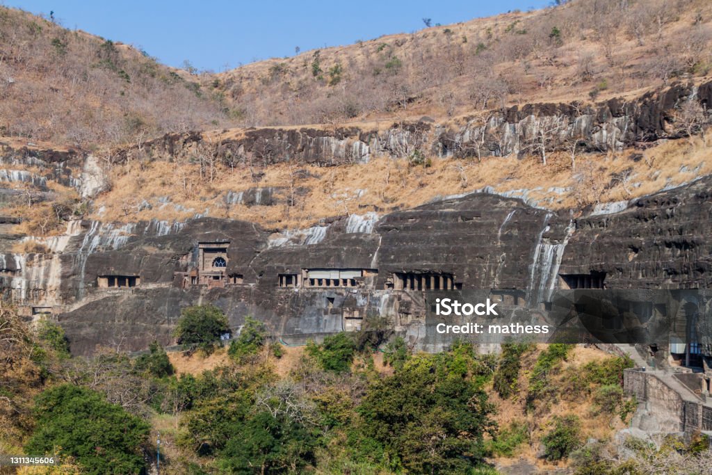 View of Ajanta, Buddhist caves carved into a cliff, Maharasthra state, Ind View of Ajanta, Buddhist caves carved into a cliff, Maharasthra state, India Ajanta Caves Stock Photo