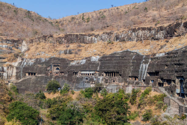 View of Ajanta, Buddhist caves carved into a cliff, Maharasthra state, Ind View of Ajanta, Buddhist caves carved into a cliff, Maharasthra state, India ajanta caves stock pictures, royalty-free photos & images