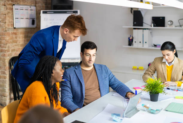 istock Business team working in a start-up office 1311348078