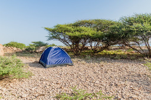 View of a tent on a rocky landscape of Oman