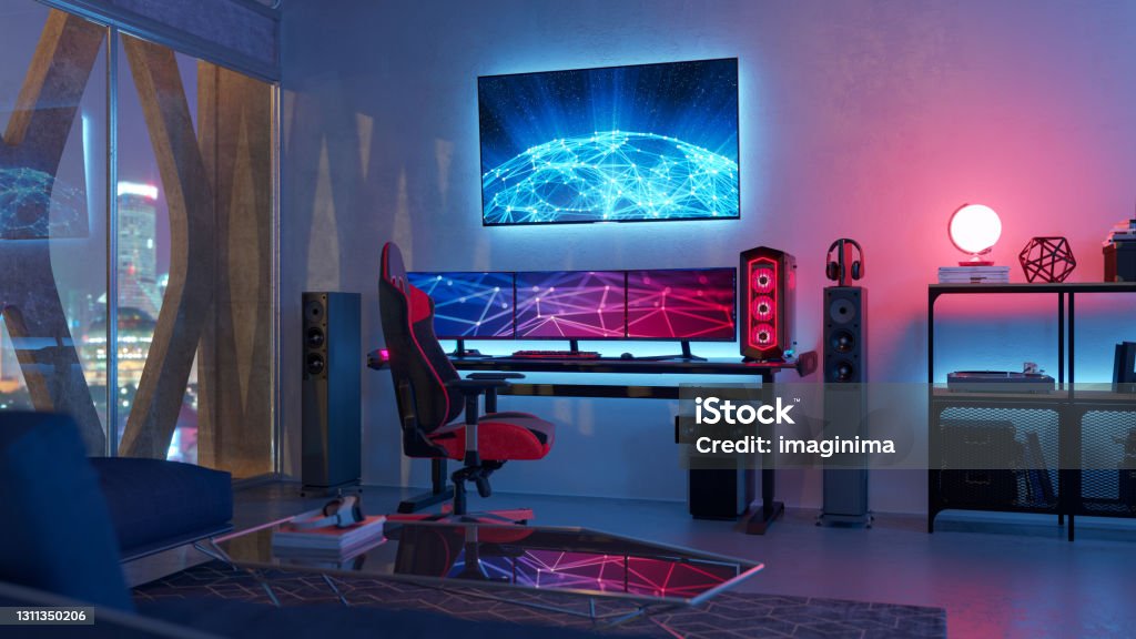 Gamer Room Interior of a gamer room lit with neon lights. Video Game Stock Photo